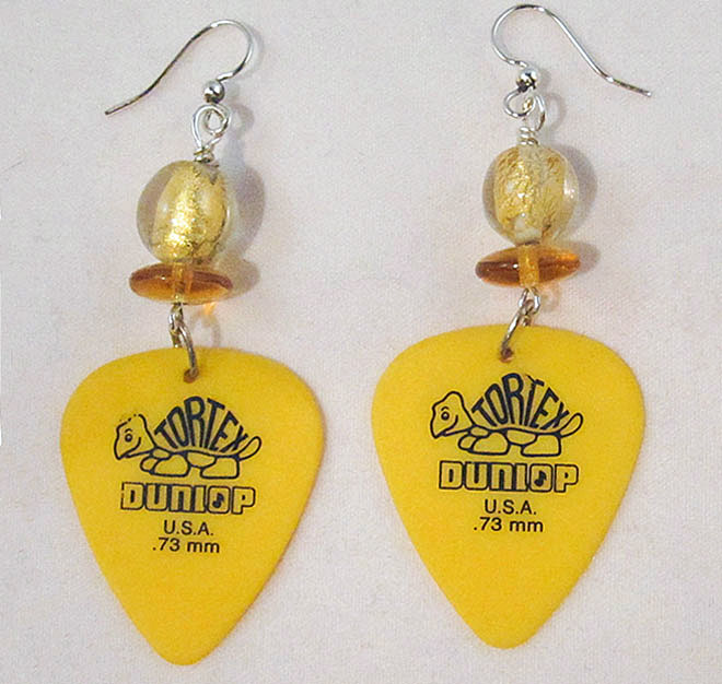 photo of earrings made by Homegrown Crafts with re purposed yellow guitar picks with coordinating beads and silver earring wires