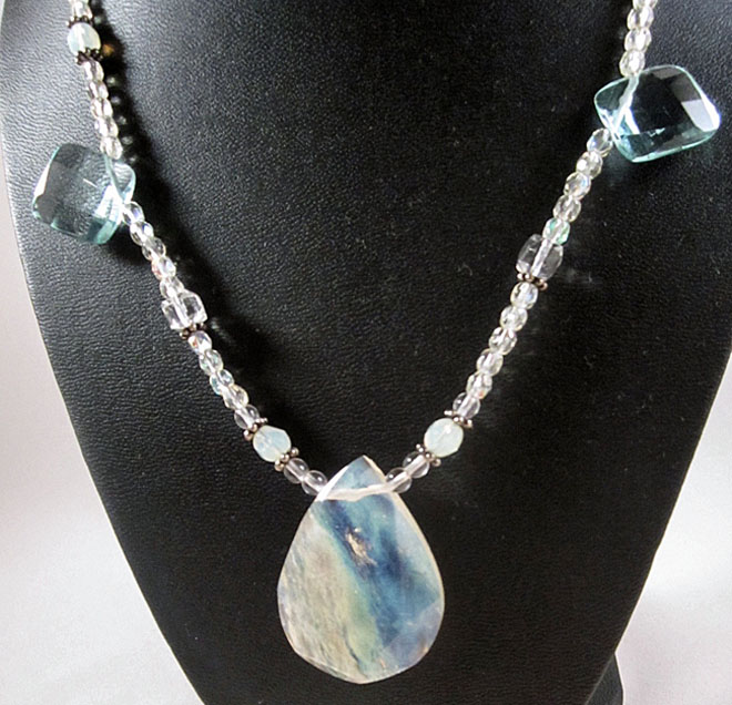 photo of necklace made by Homegrown Crafts featuring a facetted moonstone centerpiece and coordinating bead strand
