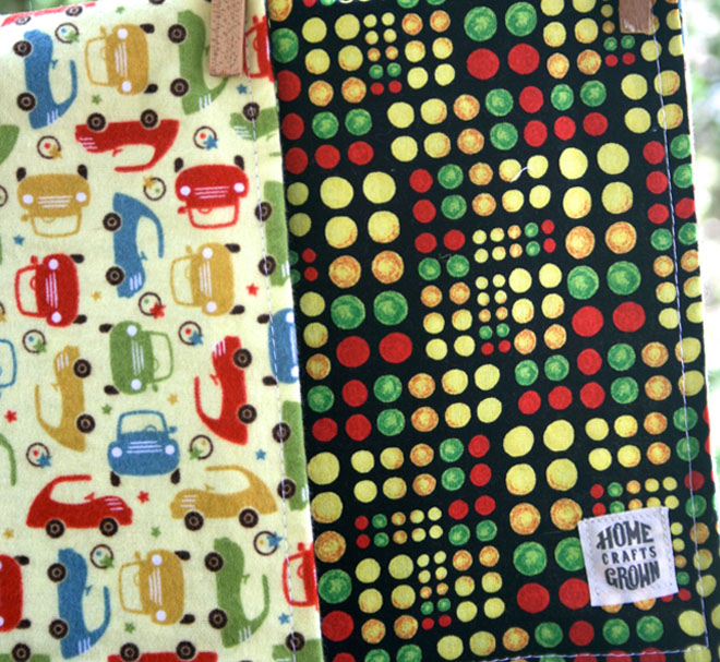 reversible toddler blanket made by Homegrown Crafts featuring yellow flannel multi color car print and cotton speedway dots print