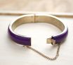 purple acrylic and gold toned hinged bangle