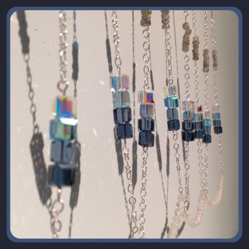close up of silver chain necklaces with beads made by Homegrown Crafts